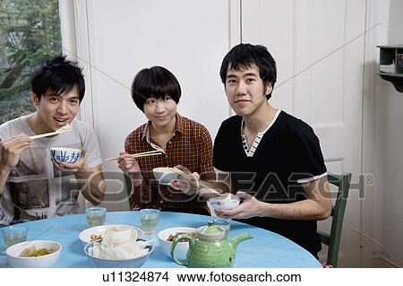 Portrait of friends having breakfast together View Large Photo Image Picture - Portrait of friends having breakfast together. Fotosearch