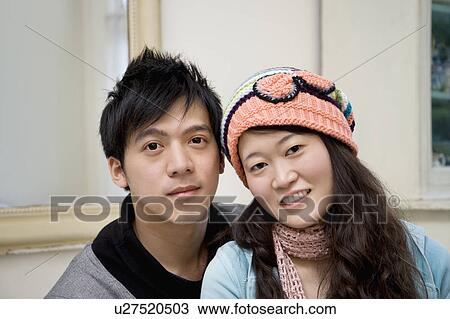 Stock Image - Portrait of young couple. Fotosearch