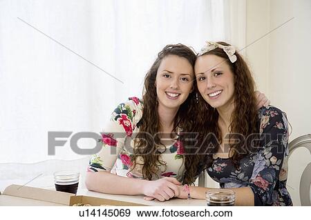Portrait of young sisters View Large Photo Image Stock Photo - Portrait of young sisters. Fotosearch