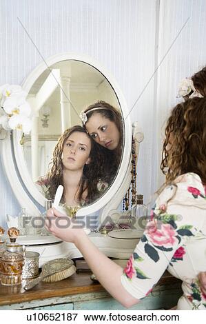 Sisters at dressing table View Large Photo Image Stock Photo - Sisters at dressing table. Fotosearch
