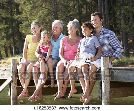 3 Generation family sitting by lake View Large Photo Image Stock Photo - 3 Generation family sitting by lake. Fotosearch
