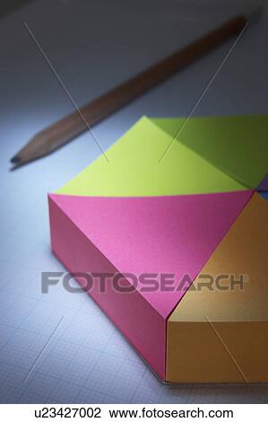 Stock Image - 3D pie-chart and pencil. Fotosearch