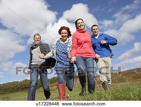 Adult group in countryside View Large Photo Image Stock Photograph - Adult group in countryside. Fotosearch
