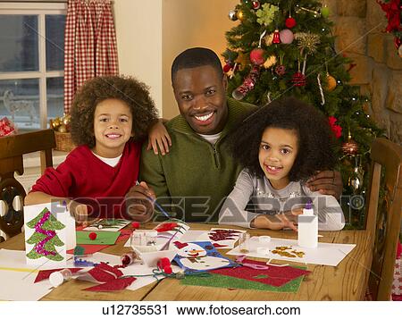 African American father making Christmas cards with children View Large Photo Image Stock Image - African American father making Christmas cards with children. Fotosearch