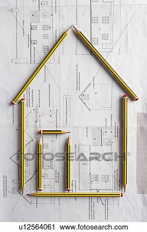 Stock Image - Architectural drawing and pencils. Fotosearch