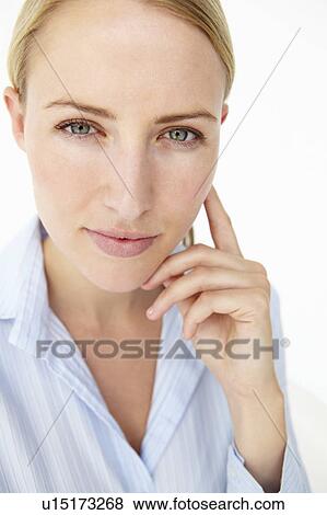 Stock Photo - Attractive young woman smiling. Fotosearch