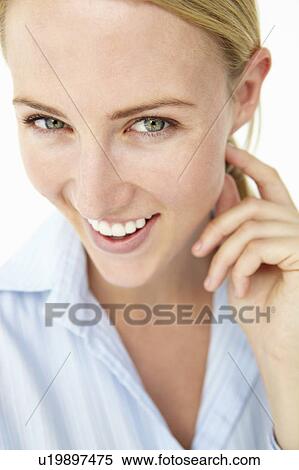 Attractive young woman smiling View Large Photo Image Stock Photography - Attractive young woman smiling. Fotosearch