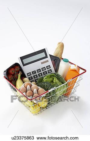 Basket of groceries and calculator View Large Photo Image Stock Image - Basket of groceries and calculator. Fotosearch