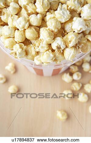 Bucket of popcorn View Large Photo Image Stock Photo - Bucket of popcorn. Fotosearch