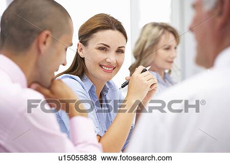 Stock Photo - Business colleagues in meeting. Fotosearch