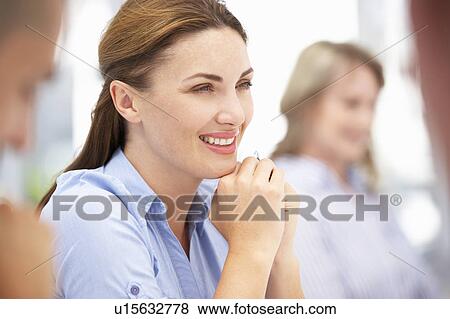 Business colleagues in meeting View Large Photo Image Stock Photo - Business colleagues in meeting. Fotosearch