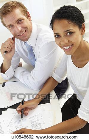 Business meeting in an office View Large Photo Image Stock Image - Business meeting in an office. Fotosearch