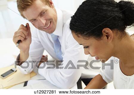 Business meeting in an office View Large Photo Image Stock Image - Business meeting in an office. Fotosearch