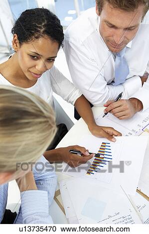 Stock Image - Business meeting in an office. Fotosearch