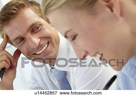 Business meeting in an office View Large Photo Image Stock Photo - Business meeting in an office. Fotosearch