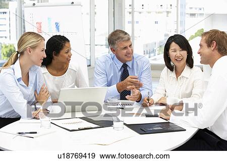 Business meeting in an office View Large Photo Image Stock Photo - Business meeting in an office. Fotosearch
