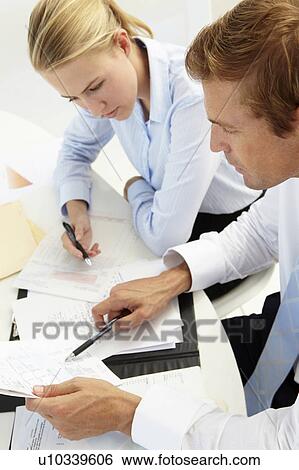 Business meeting in an office View Large Photo Image Stock Photograph - Business meeting in an office. Fotosearch