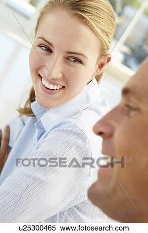 Stock Photography - Business meeting in an office. Fotosearch