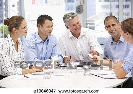 Business people in meeting View Large Photo Image Stock Photo - Business people in meeting. Fotosearch