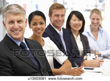 Stock Image - Business people in office. Fotosearch