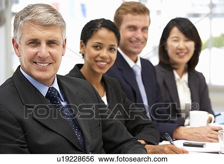 Stock Photograph - Business people in office. Fotosearch