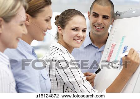 Business team working together View Large Photo Image Stock Image - Business team working together. Fotosearch