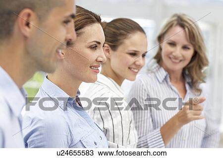 Business team working together View Large Photo Image Stock Image - Business team working together. Fotosearch