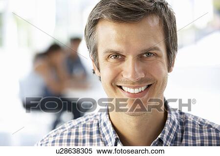 Stock Photography - Businessman in office. Fotosearch