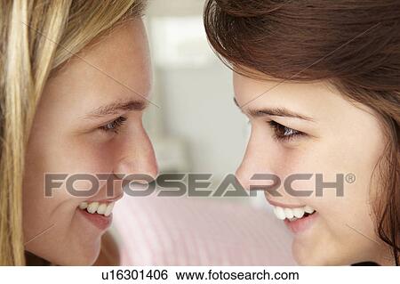Close up portrait of teenage girls in profile View Large Photo Image Stock Photograph - Close up portrait of teenage girls in profile. Fotosearch