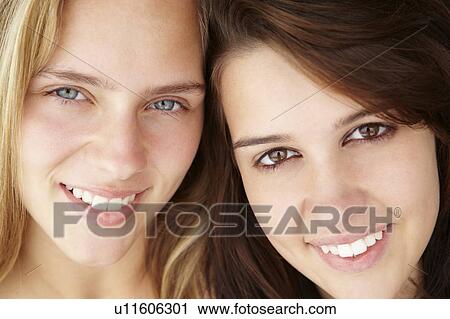 Stock Image - Close up portrait of teenage girls. Fotosearch
