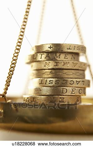 Coins on scale View Large Photo Image Stock Photo - Coins on scale. Fotosearch