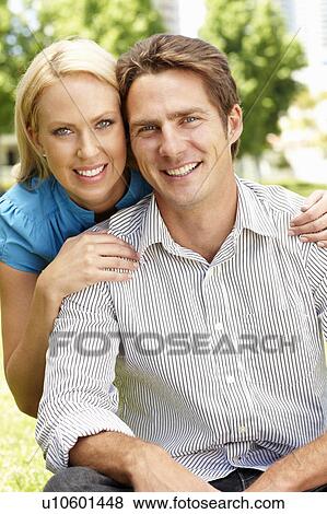 Stock Photo - Couple in city park. Fotosearch