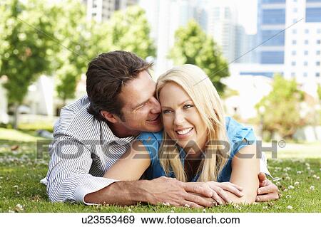 Couple in city park View Large Photo Image Stock Photo - Couple in city park. Fotosearch