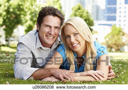 Stock Photo - Couple in city park. Fotosearch