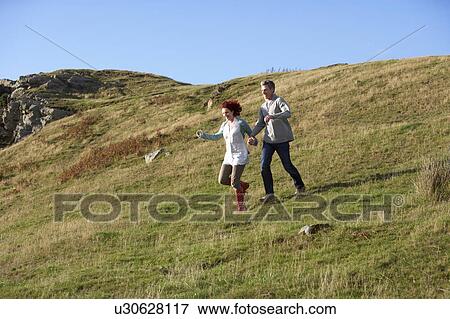 Couple in countryside View Large Photo Image Stock Photo - Couple in countryside. Fotosearch
