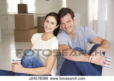 Stock Photo - Couple in new home. Fotosearch