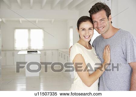 Couple in new home View Large Photo Image Stock Photography - Couple in new home. Fotosearch