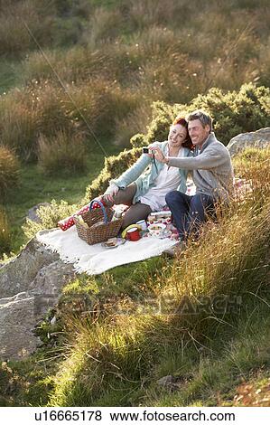 Stock Photo - Couple on country picnic. Fotosearch