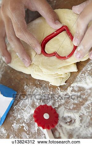 Detail close up young girl baking View Large Photo Image Stock Image - Detail close up young girl baking. Fotosearch