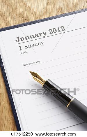 Stock Image - Detail diary and pen. Fotosearch