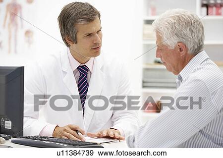 Stock Photo - Doctor with senior patient. Fotosearch