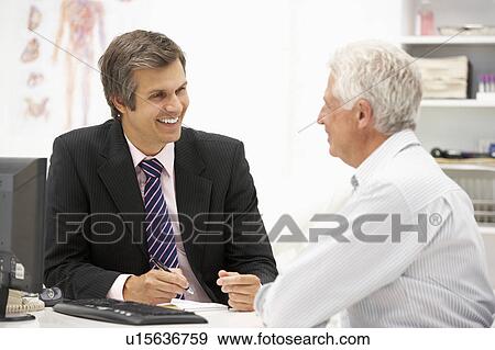 Doctor with senior patient View Large Photo Image Stock Photo - Doctor with senior patient. Fotosearch