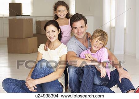 Picture - Family in new home. Fotosearch