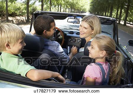 family in sports car View Large Photo Image Stock Photo - family in sports car. Fotosearch