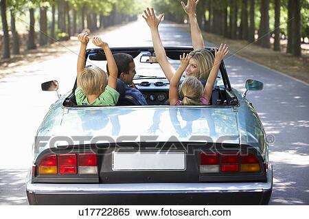 family in sports car View Large Photo Image Stock Photography - family in sports car. Fotosearch