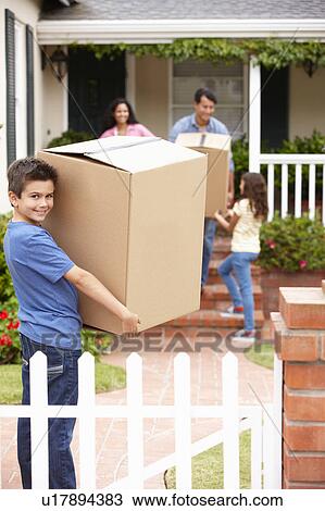 Stock Image - Family moving into rented house. Fotosearch