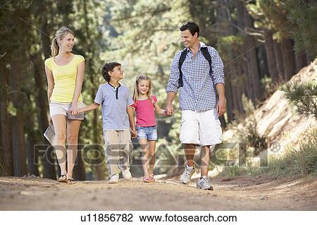 Family on country walk View Large Photo Image Stock Image - Family on country walk. Fotosearch