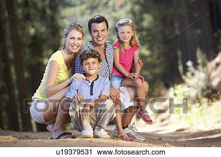 Stock Image - Family on country walk. Fotosearch