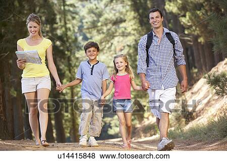 Family on country walk View Large Photo Image Stock Photo - Family on country walk. Fotosearch