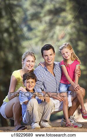 Family on country walk View Large Photo Image Stock Photo - Family on country walk. Fotosearch